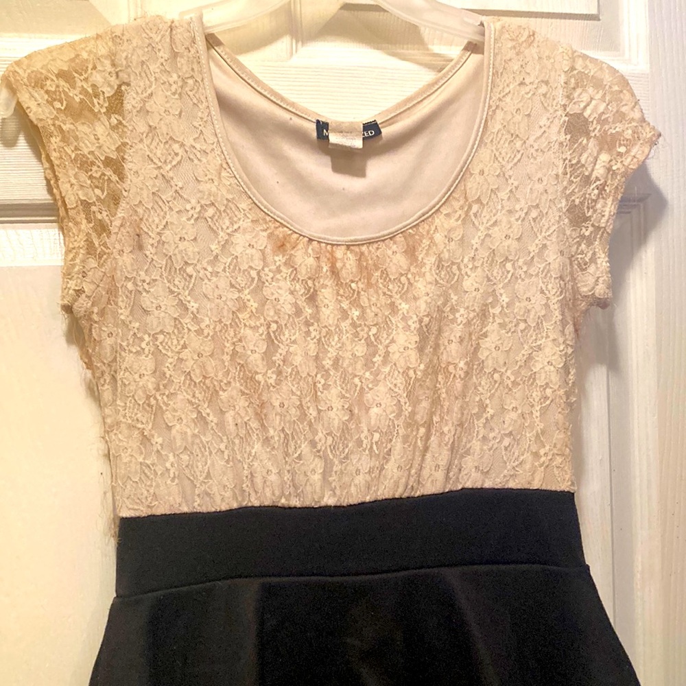Sexy tight fit black and old white top part of dress fits well to Jody